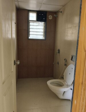 Bathroom in 3 BHK Apartment at Kunal Iconia, Mamurdi – for Rent