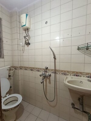 Bathroom in 1 BHK Apartment at Ravi Legend 1 CHS, Dahisar West – for Rent