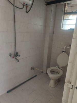 Bathroom in 2 BHK Apartment at Siddharth Nagar Phase 1, Aundh – for Rent
