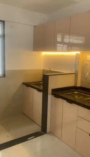 Kitchen in 3 BHK Apartment at Raga Top Towers, Wakad – for Rent