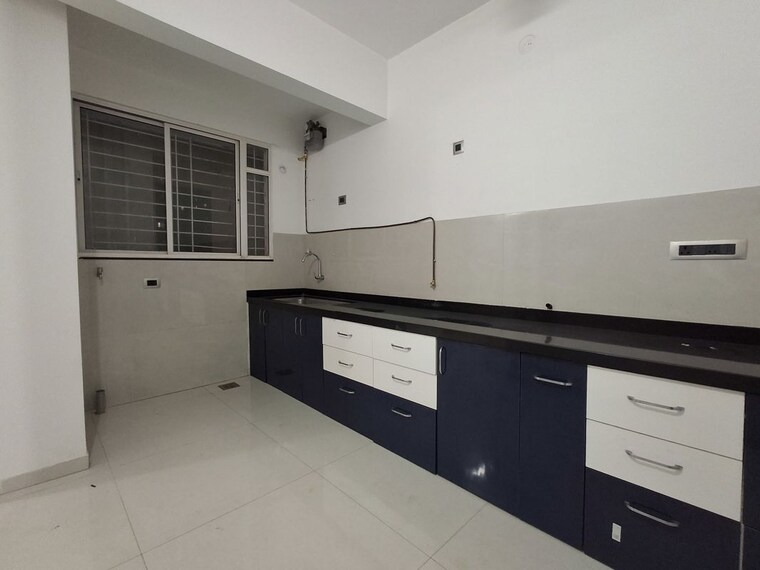 Kitchen, deu-trident 3 Bedroom 930 Sq.Ft. Apartment In Pimple Nilakh Pune 10759597