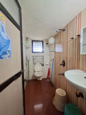 Bathroom in 1 BHK Apartment at Dedhia Daffodils, Dahisar West – for Rent