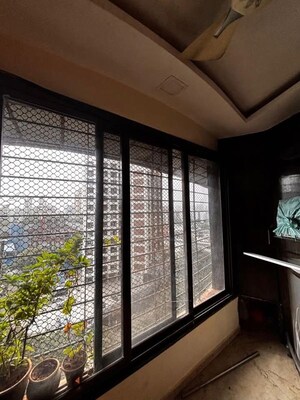 Kitchen in 2 BHK Apartment at Maharaja Retreat CHS, Goregaon East – for Rent