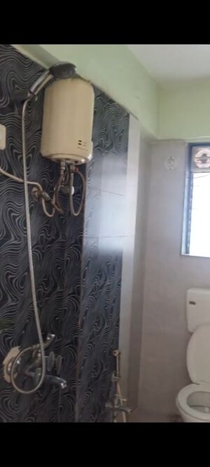 Bathroom in 2 BHK Apartment at Sahyadri CHS Parel, Parel – for Rent