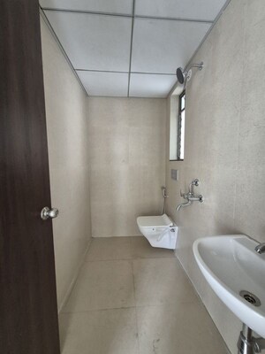 Bathroom in 1.5 BHK Apartment at Runwal My City Phase II Cluster 05, Dombivli East – for Rent