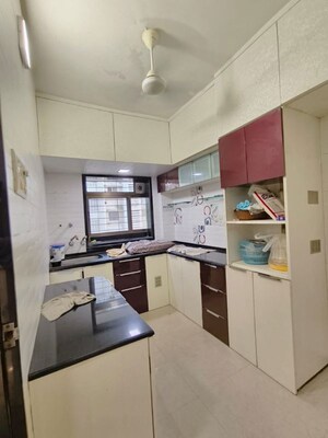 Kitchen in 3 BHK Apartment at Silver Bells CHS, Dahisar West – for Sale