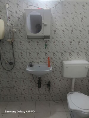 Bathroom in 3 BHK Apartment at Swapna Akar CHS, Andheri West – for Rent