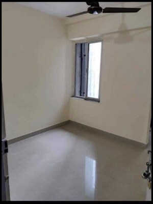 Living Room in 1 BHK Apartment at MHADA Prakash Cotton Mill, Lower Parel – for Rent