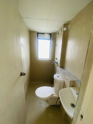 Bathroom in 2 BHK Apartment at Runwal Primrose, Dombivli East – for Rent