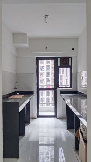 Kitchen in 2 BHK Apartment at Runwal Gardens, Dombivli East – for Rent