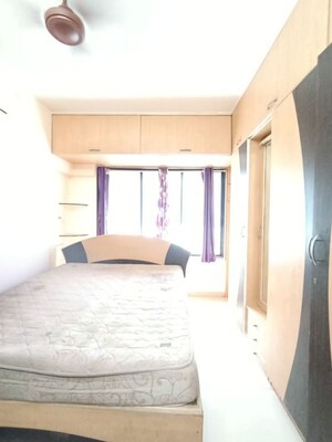 Bedroom in 1 BHK Apartment at Dedhia Daffodils, Dahisar West – for Rent