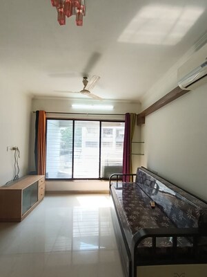 Living Room in 1 BHK Apartment at Dedhia Daffodils, Dahisar West – for Rent