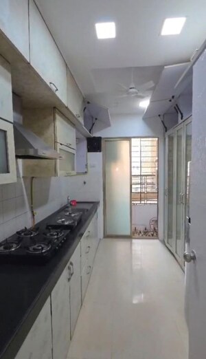 Kitchen in 2.5 BHK Apartment at Oberoi Springs, Andheri West – for Rent