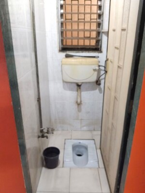Bathroom in 1 BHK Apartment at Tulsi Pooja CHS, New Panvel East – for Rent