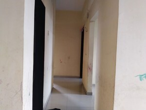 Building Lobby in 1 BHK Apartment at Milan CHS, New Panvel East – for Rent