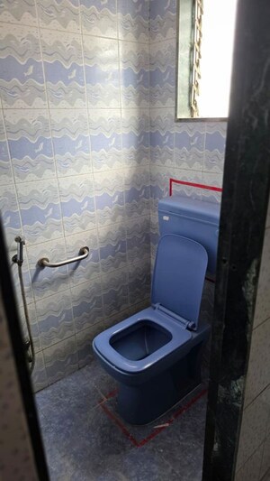 Bathroom in 1 BHK Apartment at Vallabh CHS, Goregaon West – for Rent