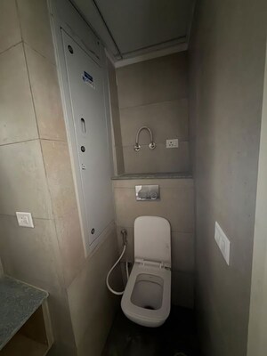 Bathroom in Studio Apartment at Gaur Yamuna City Gaur Suites, Gaur Yamuna City – for Sale
