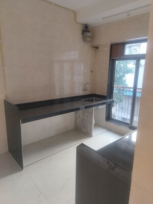 Kitchen in 2 BHK Apartment at Vishnu Nagar – for Sale