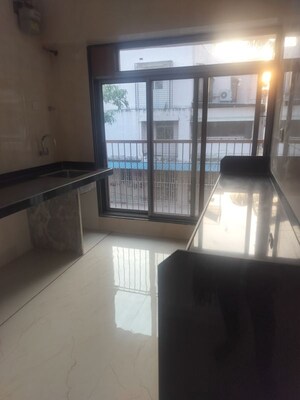 Kitchen in 2 BHK Apartment at Vishnu Nagar – for Sale