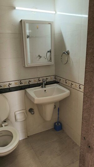 Bathroom in 1 BHK Apartment at K Raheja Heights, Malad East – for Rent