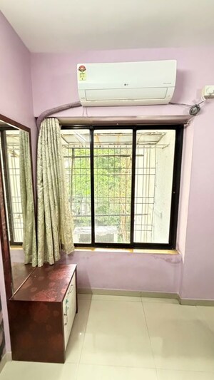Bedroom in 2 BHK Apartment at Harmony Tower, Ghodbunder Road – for Rent
