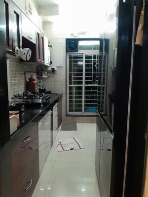 Kitchen in 2 BHK Apartment at Nandwara Elite Heights, Kharghar – for Rent