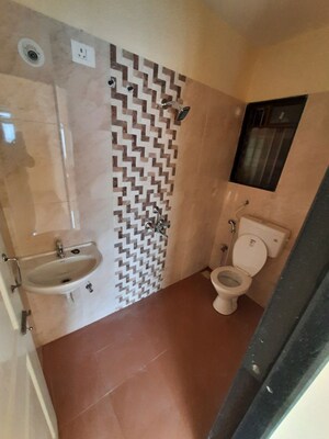 Bathroom in 3 BHK Apartment at Hubtown Greenwoods, Vartak Nagar – for Rent
