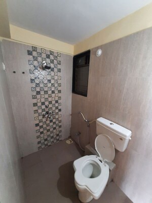 Bathroom in 3 BHK Apartment at Hubtown Greenwoods, Vartak Nagar – for Rent