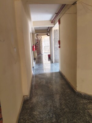 Building Lobby in 3 BHK Apartment at Aims Golf City, Sector 75 – for Rent