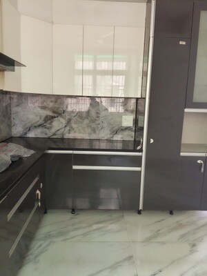 Kitchen in 3 BHK Apartment at Aims Golf City, Sector 75 – for Rent