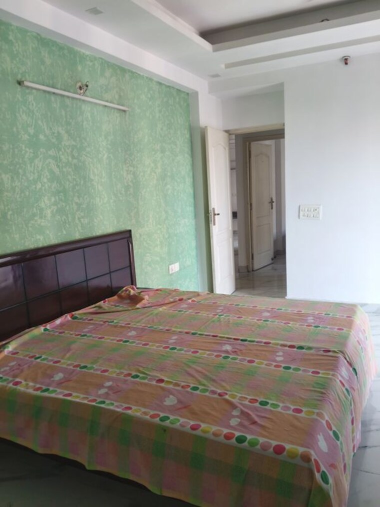 Bedroom, aims-golf-city 3 Bedroom 1350 Sq.Ft. Apartment In Sector 75 Noida 10760802