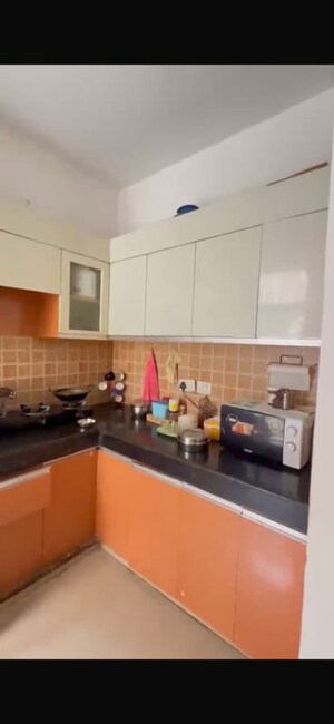 Kitchen in 2.5 BHK Apartment at Mahagun My Woods, Sector 16c Greater Noida – for Rent