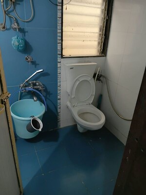 Bathroom in 1 BHK Apartment at Om Sai Palace CHS, Mira Road East – for Rent