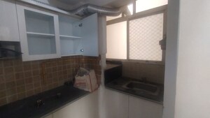 Kitchen in 2 BHK Apartment at Mahagun Mywoods II, Sector 16c Greater Noida – for Rent