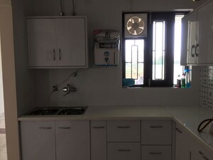 Kitchen in 3 BHK Builder Floor at Emaar MGF Emerald Hills, Sector 65 – for Sale