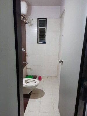 Bathroom in 2 BHK Apartment at Tejas Estate Poorva Residency, Pimple Saudagar – for Rent