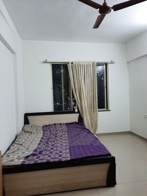 Bedroom in 2 BHK Apartment at Tejas Estate Poorva Residency, Pimple Saudagar – for Rent