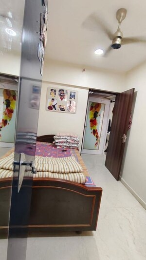 Bedroom in 2 BHK Apartment at Sangam Veda, Andheri East – for Rent