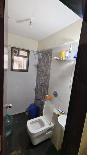 Bathroom in 2 BHK Apartment at Sangam Veda, Andheri East – for Rent