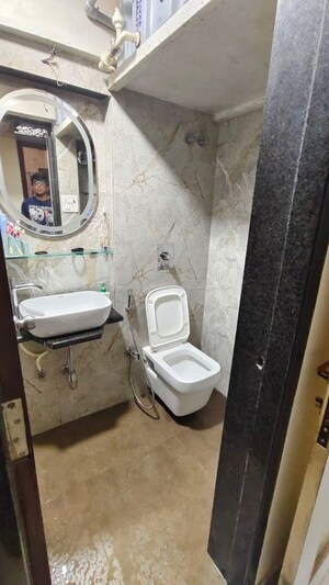 Bathroom in 2 BHK Apartment at Sangam Veda, Andheri East – for Rent