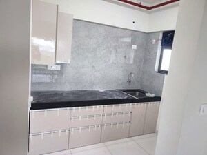 Kitchen in 1 BHK Apartment at Paranjape Blue Ridge, Hinjewadi – for Rent