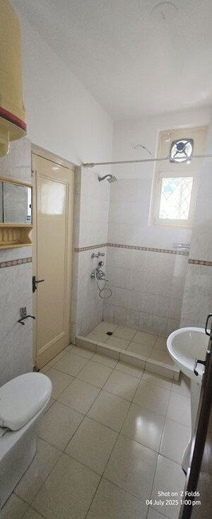 Bathroom in 4 BHK Builder Floor at Sarvodaya Enclave – for Rent
