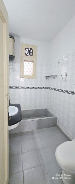 Bathroom in 4 BHK Builder Floor at Sarvodaya Enclave – for Rent