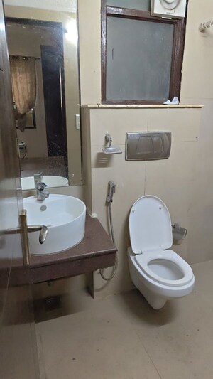 Bathroom in 2 BHK Apartment at Unitech Uniworld Gardens 2, Sector 47 – for Rent