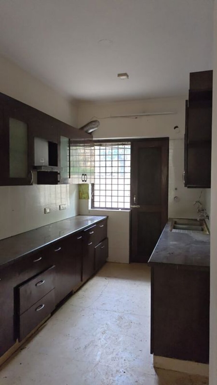 Kitchen, unitech-uniworld-gardens-2 2 Bedroom 973 Sq.Ft. Apartment In Sector 47 Gurgaon 10761006