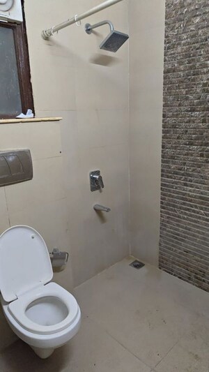 Bathroom in 2 BHK Apartment at Unitech Uniworld Gardens 2, Sector 47 – for Rent