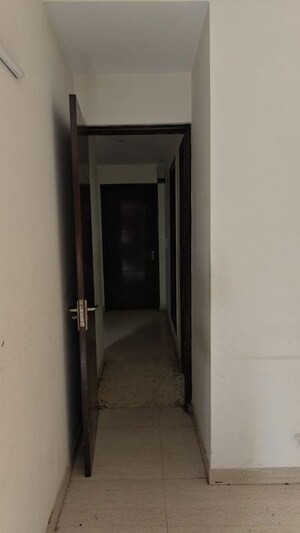 Building Lobby in 2 BHK Apartment at Unitech Uniworld Gardens 2, Sector 47 – for Rent