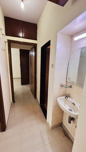 Bathroom in 2 BHK Apartment at Marathon Cosmos, Mulund West – for Rent