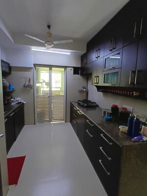 Kitchen in 4 BHK Apartment at Lokhandwala Whispering Palms XXclusives, Kandivali East – for Rent