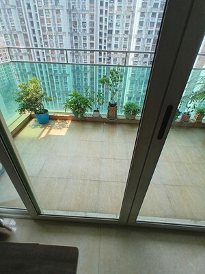 Balcony in 4 BHK Apartment at Lokhandwala Whispering Palms XXclusives, Kandivali East – for Rent